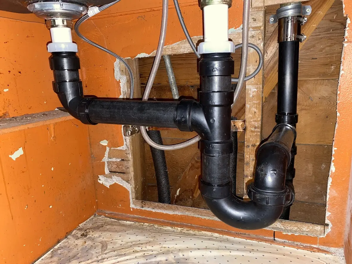 Professional Garbage Disposal Repair equipment and tools on the job in Childersburg